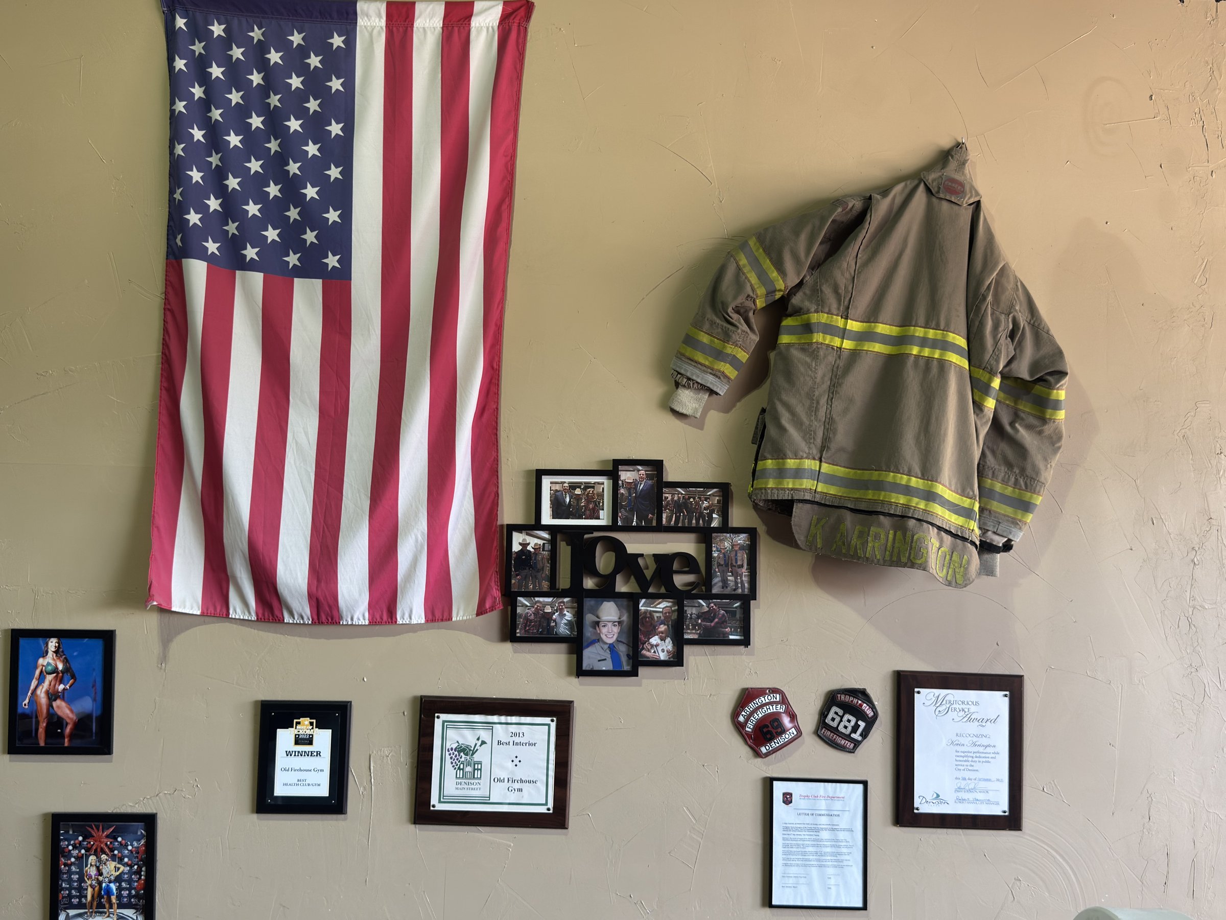 American flag and firefighter memorabilia wall